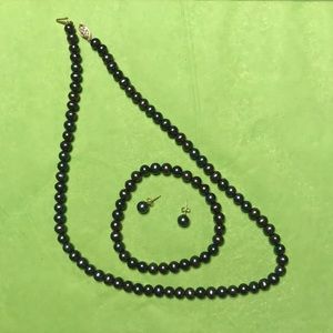 Three pieces multicolor jewelry set.